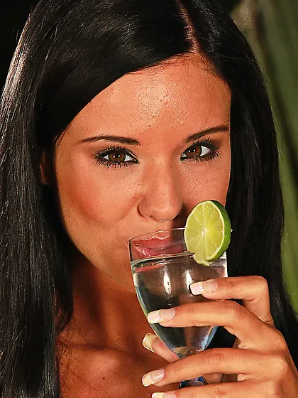 Long legged Ashley Bulgari with neat bald pussy removes her shor