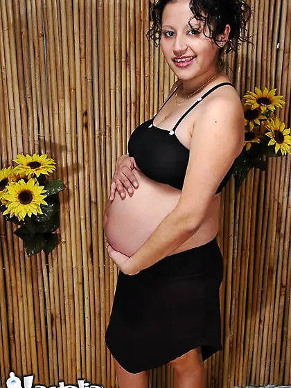 Pregnant slut Talia playing with her tits and snatch