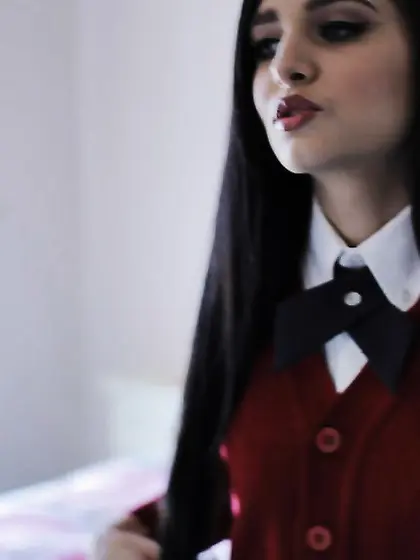 Offensive slut with long black hair flashes her small tits witho