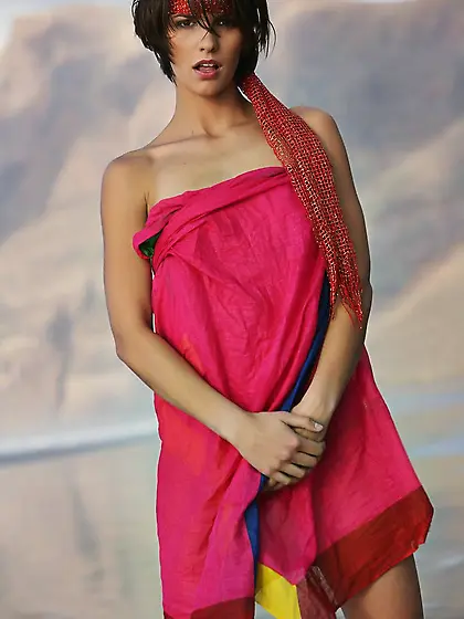 Hottie with a headband posing totally naked on a scenic beach Vi