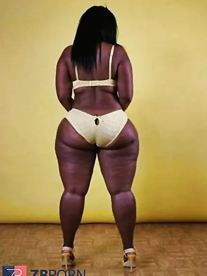 Ginormous dark-hued butt in high-heeled slippers