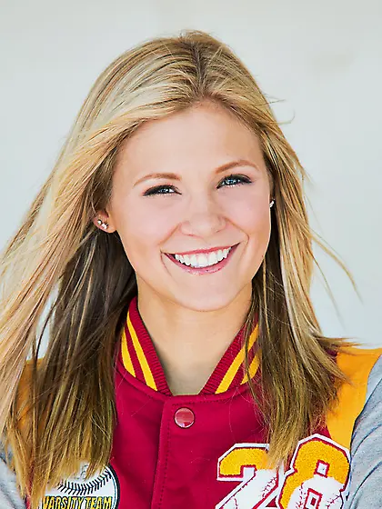 Blonde teen slowly stripteasing