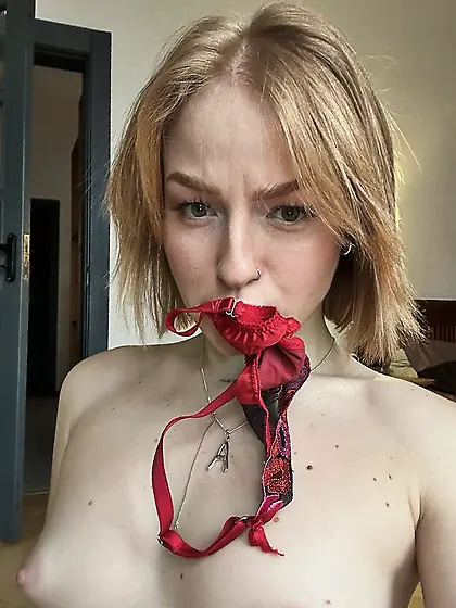 Panties in her mouth