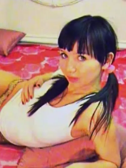 Pigtailed brunette pink thong