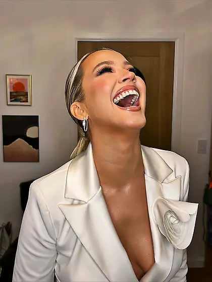 Anna Canp in a white top