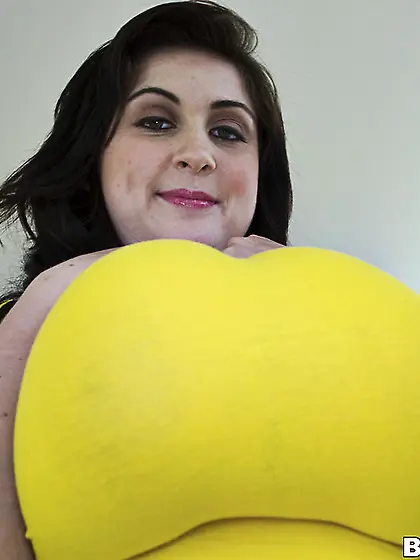 Hot bitch with some unbelievable large boobs bares her curvy bod