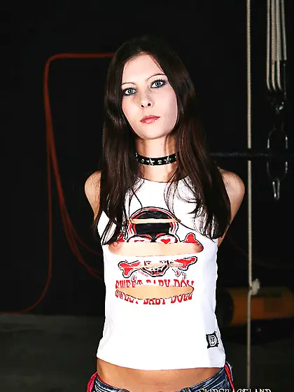 Attractive girl's poker face says that BDSM is a usual thing for