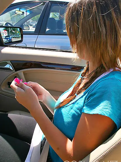 Slim hussy with sexy piercing shows her enormous tits on a sunny