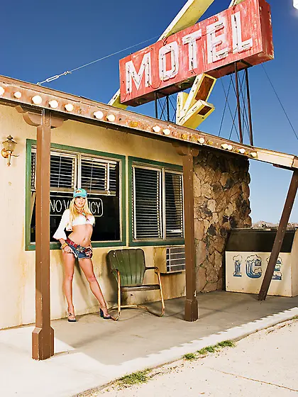 Hot and sexy blond babe,  Shawna Lenee gets off her sexy clothes