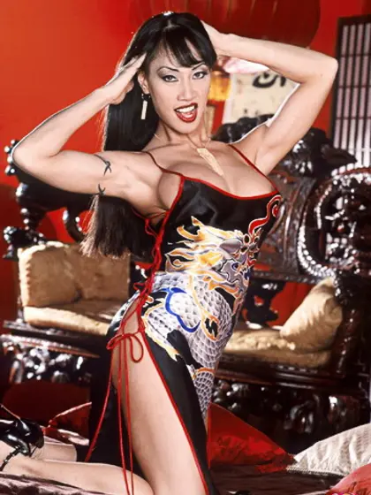 Lovely pornstar Mimi Miyagi shows her big tits springing free fr