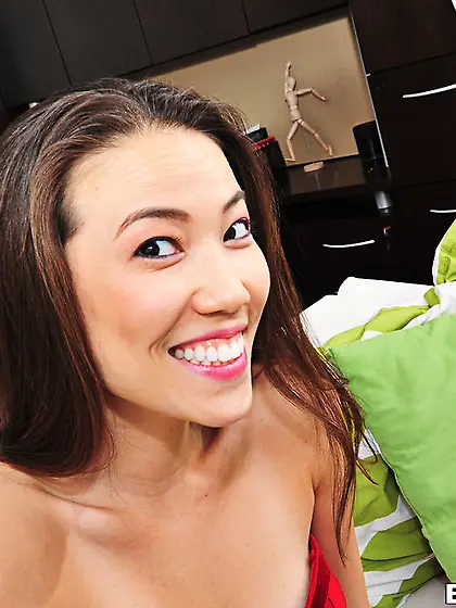 Asian teen loves to spread her pussy on camera and have sex with