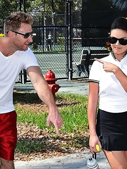 Two dark-haired babes sharing a massive cock in a hardcore FFM