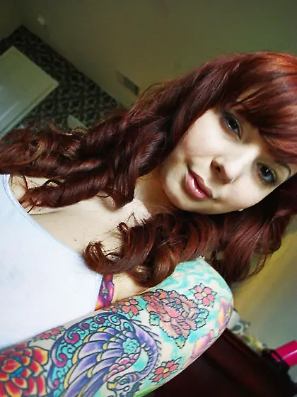 Girl with wonderful tattooed body Ivy Jean is demonstrating her