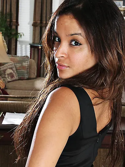 Latina in fishnets showing off her perfect-looking teen pussy