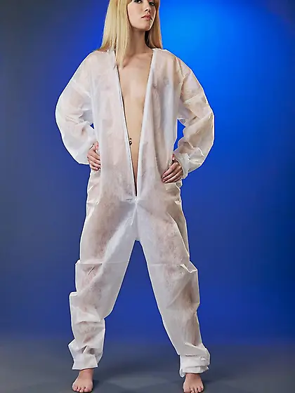 Perfect teen takes off her strange see-through outfit on camera