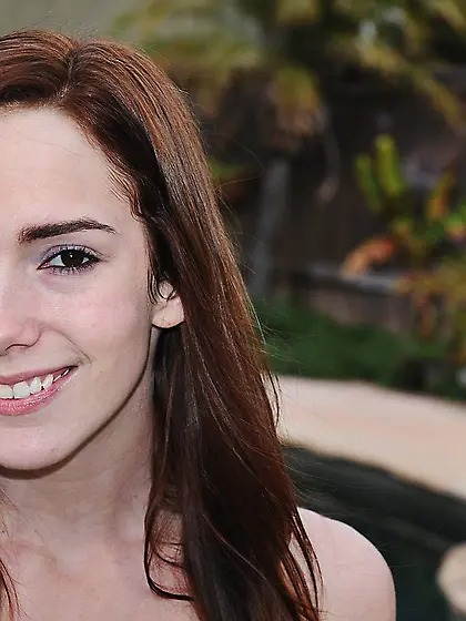 Denim shorts exotic redhead gets naked next to a swimming pool