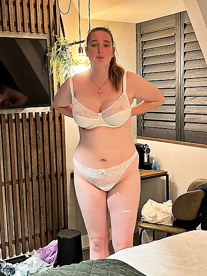 Chubby wife slowly undressing for husband