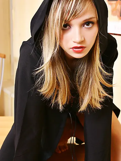 Hot blonde chick Kristina Fey strips her black hoodies and shows