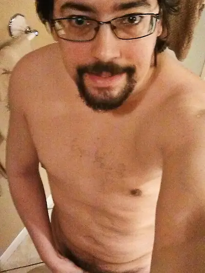 nude nerd guy with glasses shows tiny erect penis