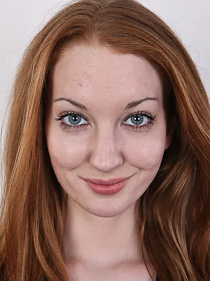 Chick with beautiful red hair and pale skin exposes tiny breasts