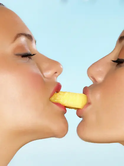 Two bikini-clad beauties eating each other's lovely pussies