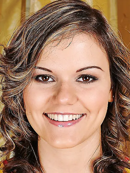 Adorable brunette beauty doffs clothes to showcase her sexy nake