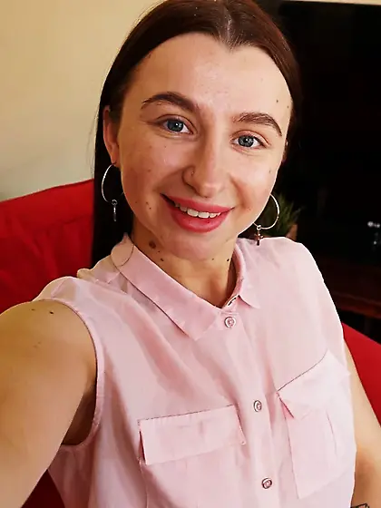 Cute brunette shows off her petite curves