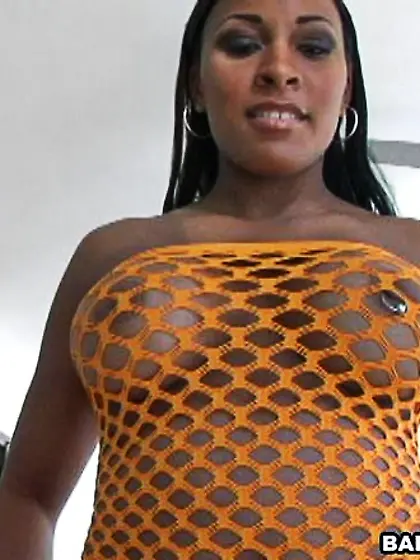 Oiled ass rides a huge cock