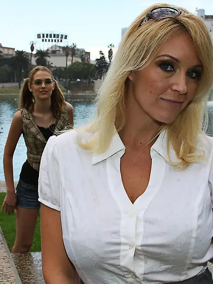 Pigtailed teen and a blond-haired MILF double team a black dick