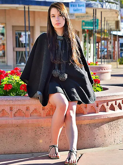 Beautiful babe Aeris FTV is sitting on flowerbed out in city and