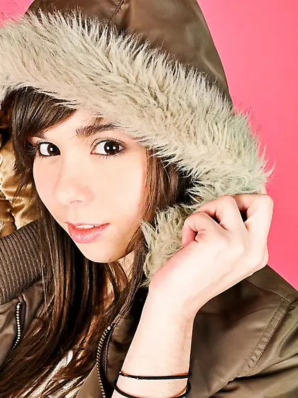 Sweet Ariel Rebel boasts about her new down-padded coat and her