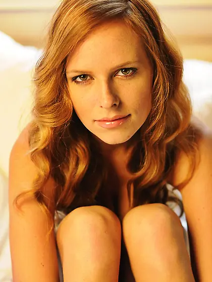 Alluring blonde model Carmen Gemini strips her white thongs and