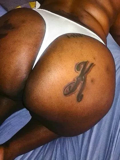 Big fat ass initials tattooed