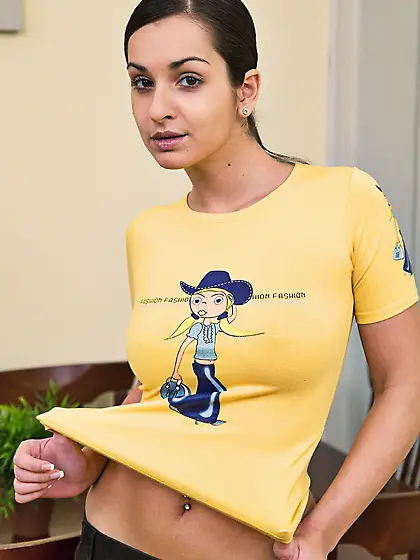 The beautiful brunette bimbo Ennie is stripping and boasting the