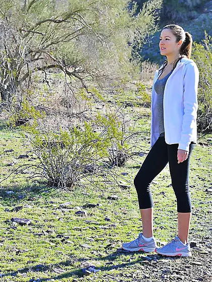 Charming teen looking gal Coco Rose playfully shows her nude tit