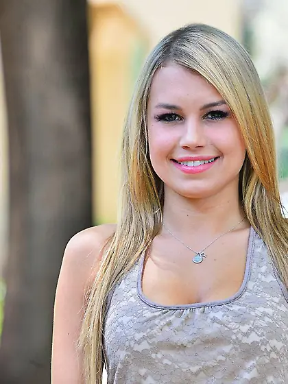 Horny blonde Kendall Kayden shows off her busty boobs and shaved