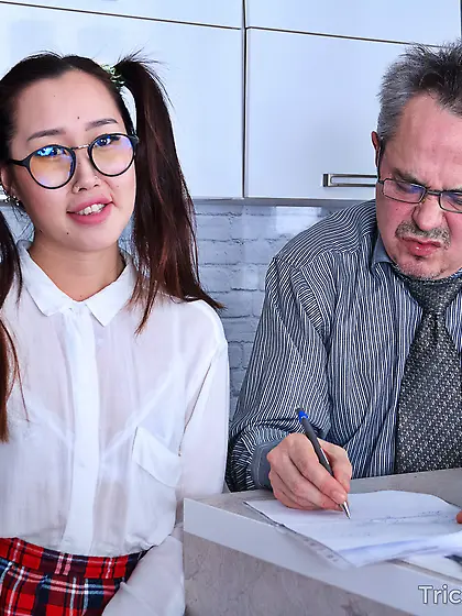 asian schoolgirl with teacher
