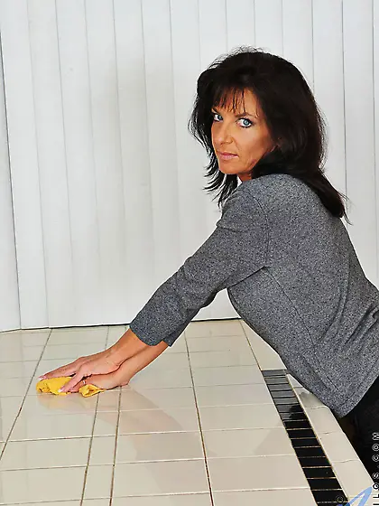 Brunette milf Sarah Bricks stripping, playing with pantyhose and