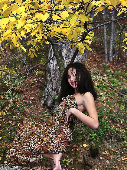 Lovely brunette Beata has some outdoor fun getting naked and mak