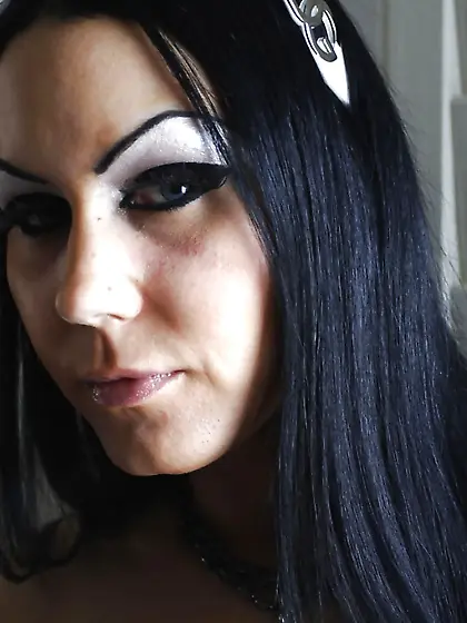 Inked femme fatale in fishnet outfit puts buttplug in ass and vi