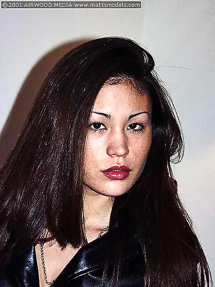 Slim asian Jade Hsu with big pussy lips removes her black jacket