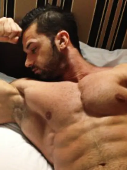 Brunette adonis perform close