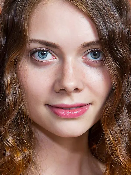 Wavy haired teen Kei A turns into a softcore seductress to pose