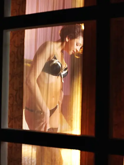 Sneakily spying on your seductive neighbor has never been sexier