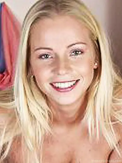 Keeping her pantyhose while smiling and posing for the camera