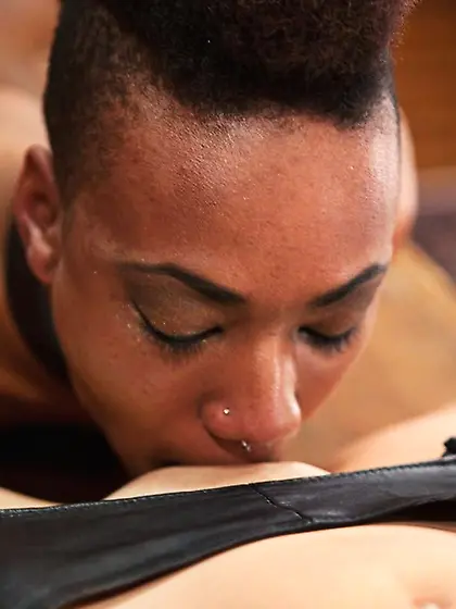 Ebony doll is placed on a St