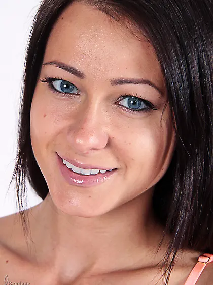 Playful brunette beauty tied