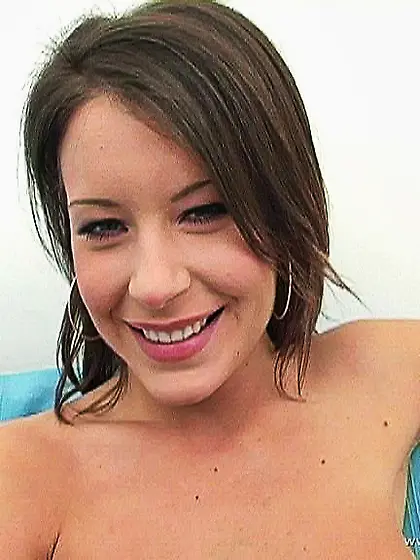 Lora Craft spreads her sexy legs for the camera and fingers her