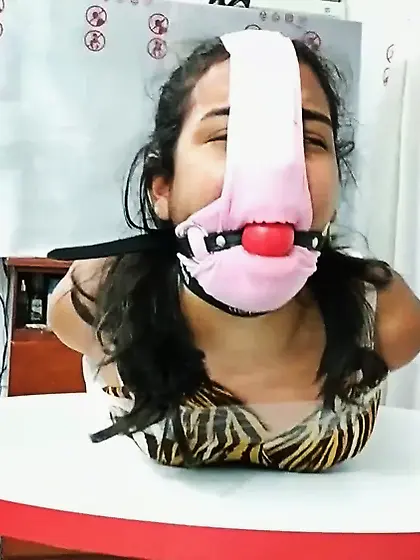 Hogtied Girl Panty Hooded And Ball Gagged
