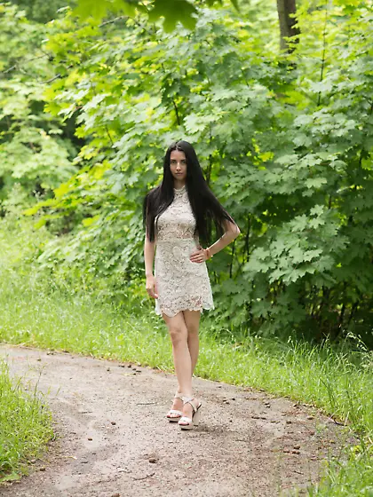 Adorable brunette Veronica Snezna shows her boobs while outside